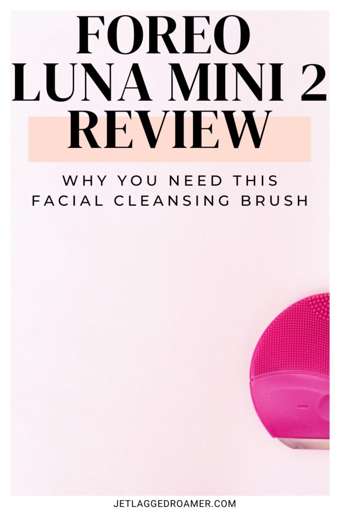 Pinterest pin for FOREO Luna Mini 2 Review. Pink Luna Mini 2. Text says FOREO Luna Mini 2 Review why you need this facial cleansing brush.