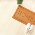 Stay at home ideas photo of a mat that says home.