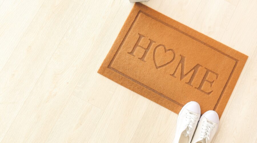 Stay at home ideas photo of a mat that says home.