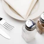 Restaurants in Miami photo of a restaurant table with a plate and silverware.