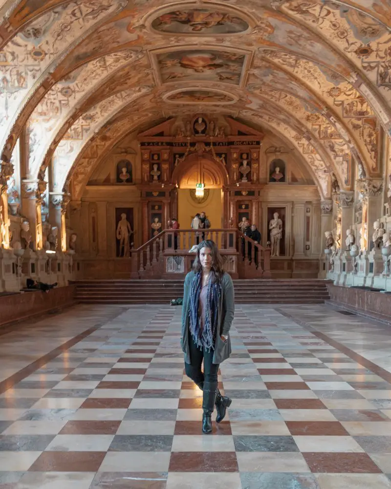 Me standing in a hallway at Munich Residenz.