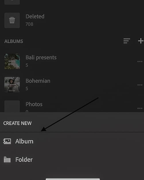 Arrow pointing to album in Lightroom mobile.