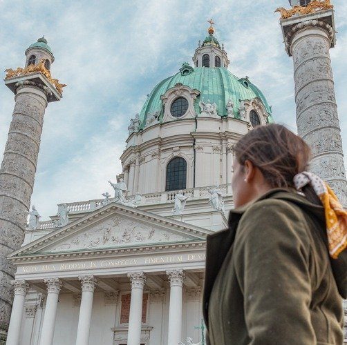 Me at KARLSKIRCHE one of the top places to see spending one day in Vienna.
