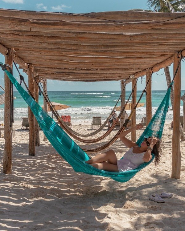 me lying on a hammock on the beach playing with my hair