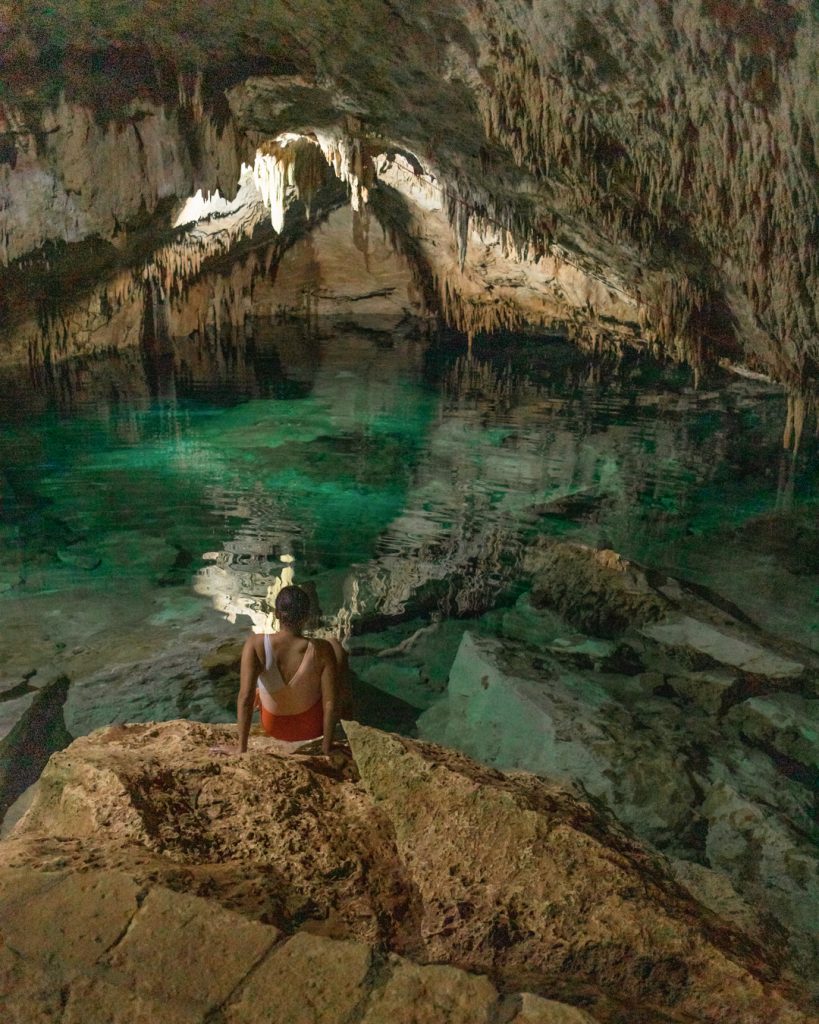 Me looking at a cenote at Dos Ojos.