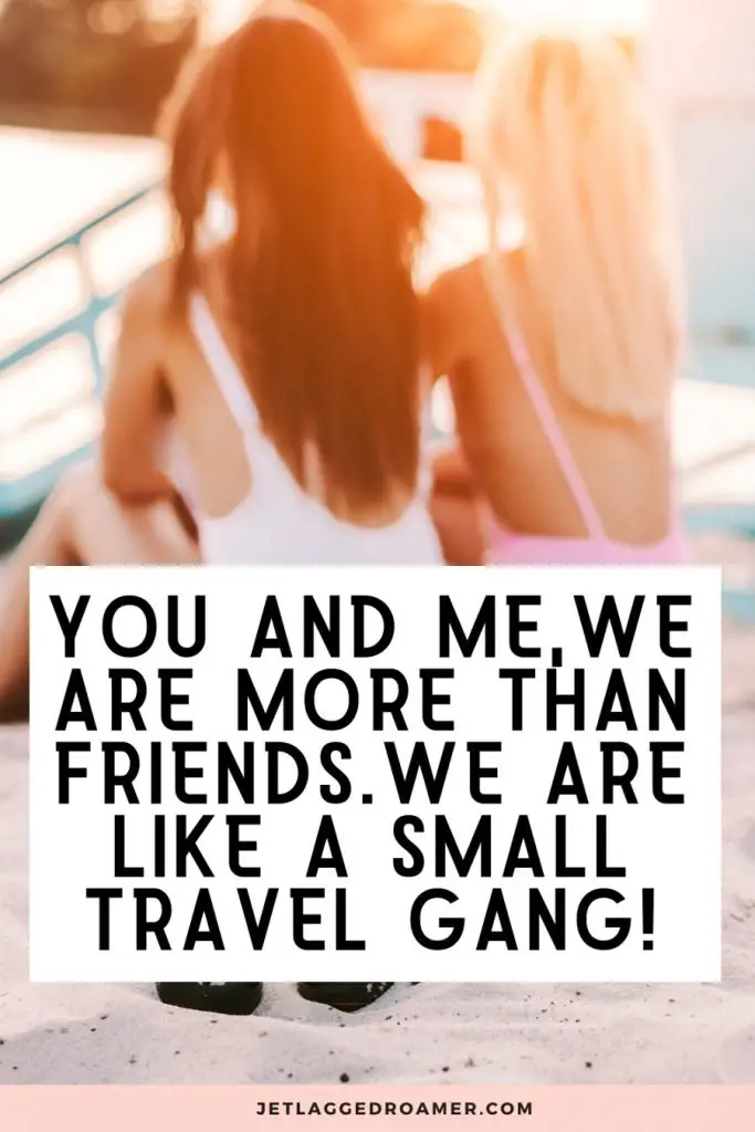 Two girls on a beach during sunset with a funny quote about traveling with friends that reads “You and me, we are more than friends. We are like a small travel gang!”