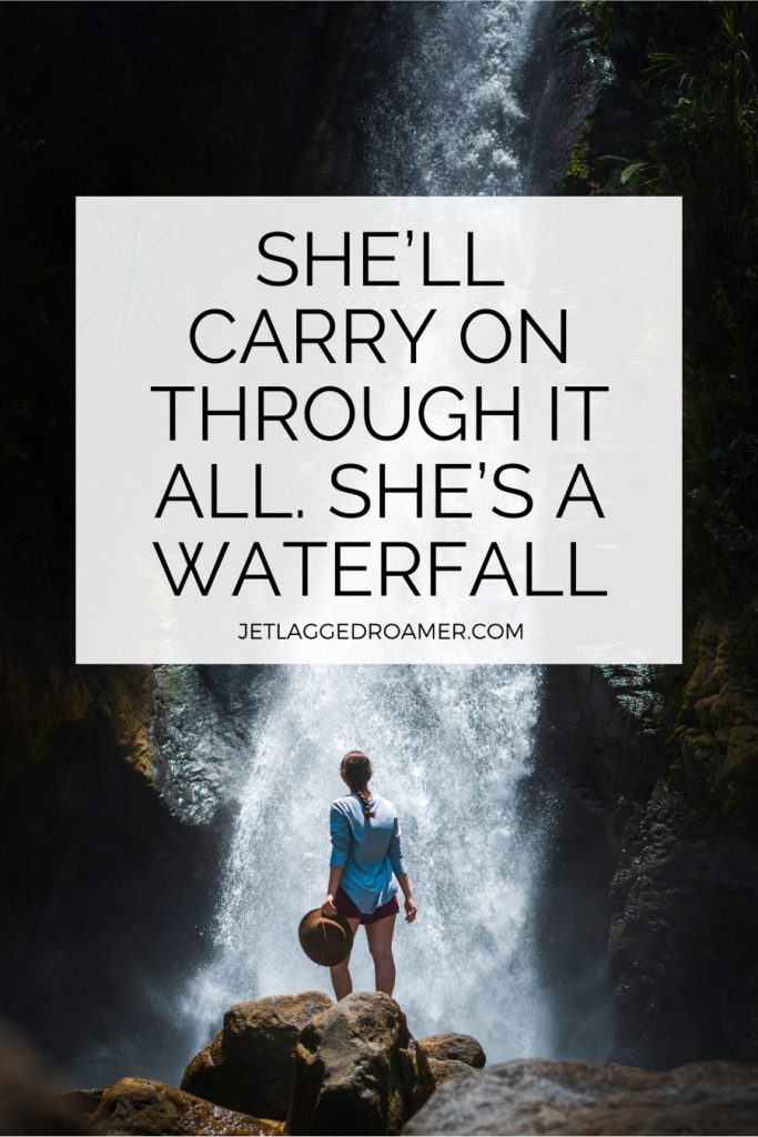 Woman standing on a rock and text reads quote "She’ll carry on through it all. She’s a waterfall.”- Unknown