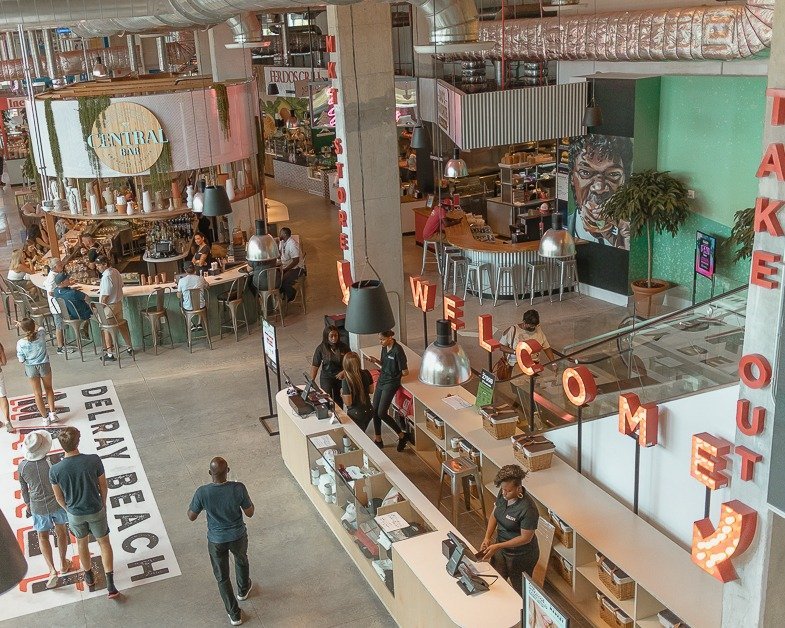 Inside a busy Delray Beach Market one of the best things to do in Delray Beach.