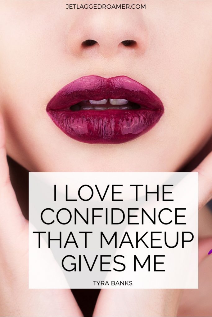 Make up quote for Instagram that reads I love the confidence that make up gives me by Tyra Banks. Image of a woman from nose to chin wearing dark lipstick.