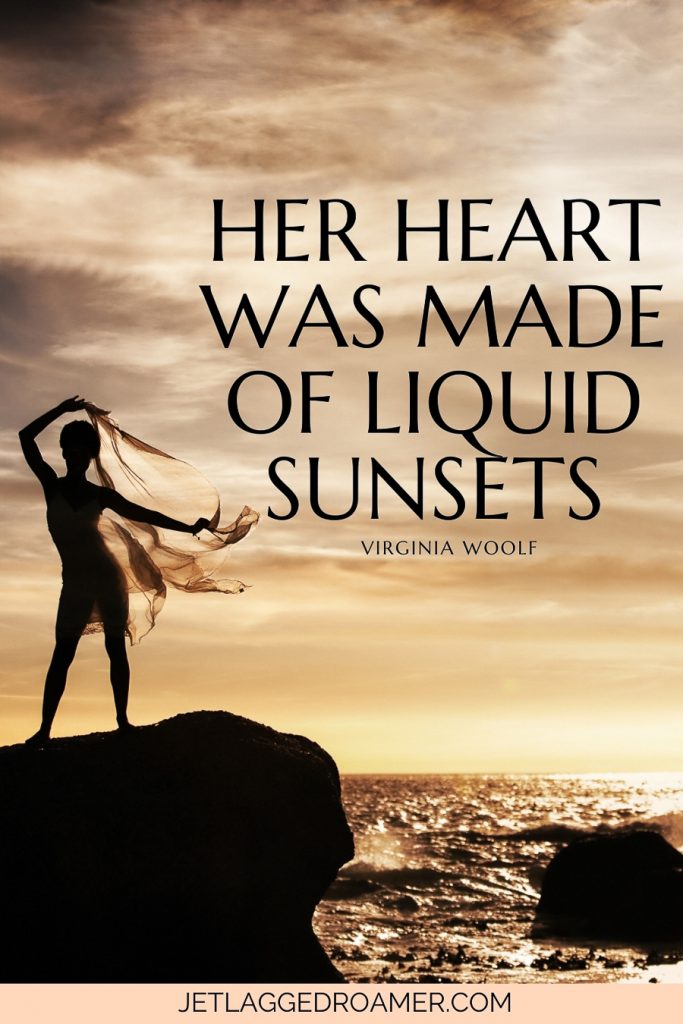 Text reads “Her heart was made of liquid sunsets.” — Virginia Woolf. Woman on a boulder at the beach posing during sunset. 