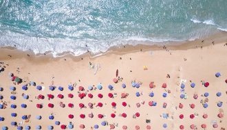 Aerial view of a beach in Florida on a sunny day for Florida packing list