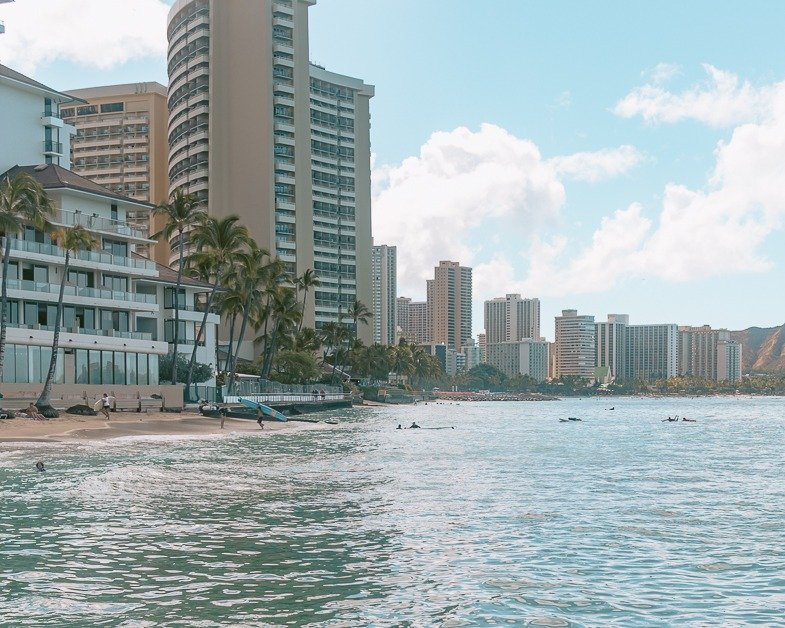 Waikiki beach on a sunny day. It's one of the top places to visit in Honolulu.