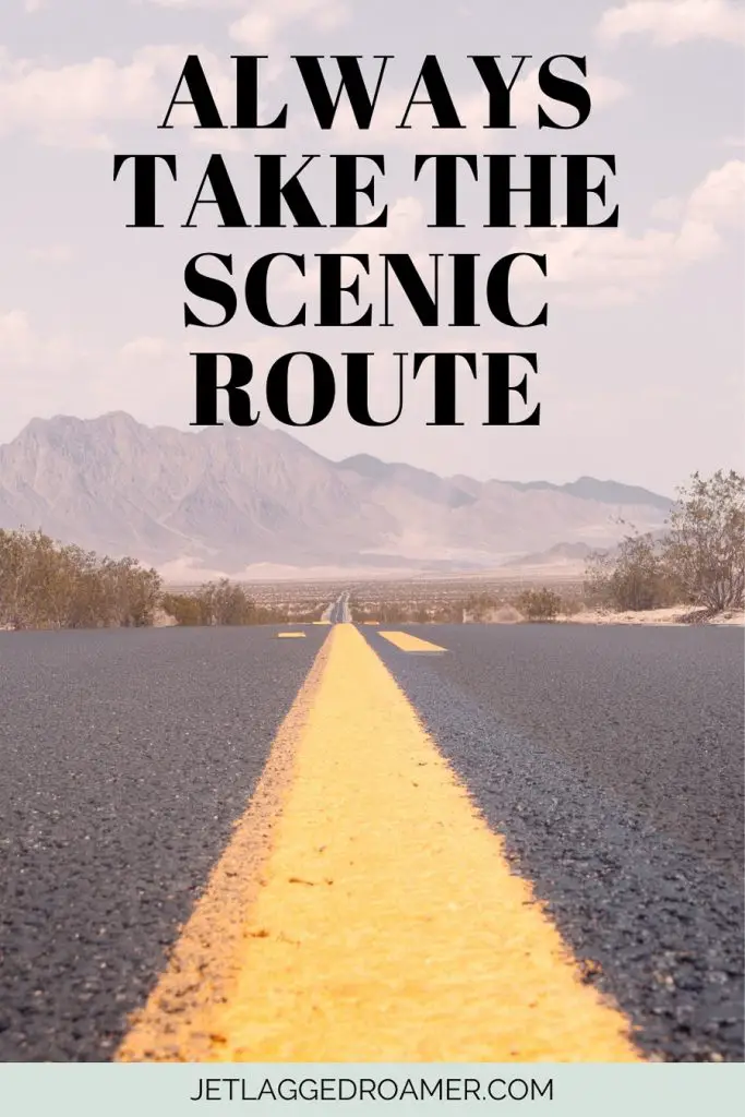 Open road and a captions for a travel about road trips that says always take the scenic route. 