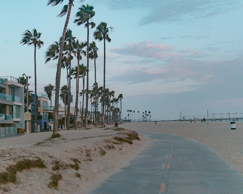 Venice Beach during sunset one of the top places to visit during a layover in Los Angeles. 