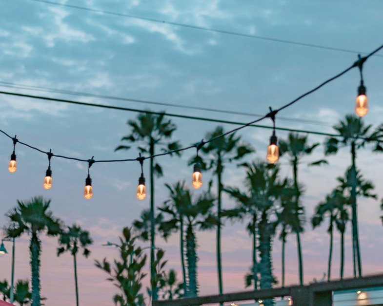 Hanging lights and a Los Angeles sunset.