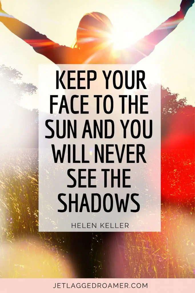 One of the sunshine quotes for Instagram that says keep your face to the sun and you will never see the shadows by Helen Keller. Woman in a field during sunrise.