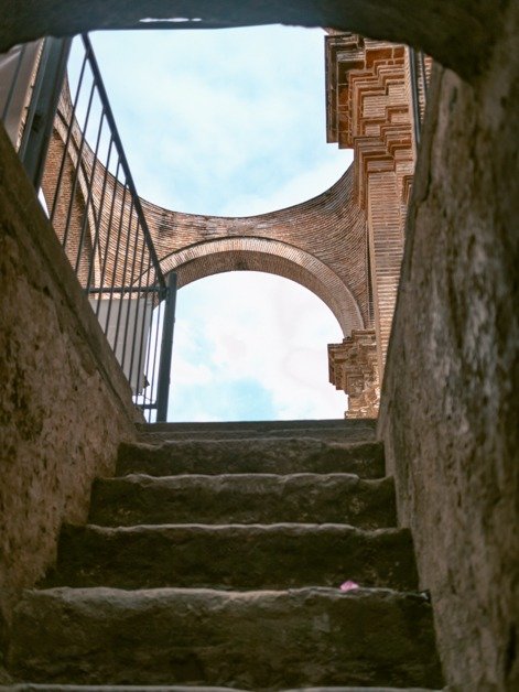 Stairwell looking at the sky at Cathedral de Santiago. One of the top Antigua, Guatemala activities. 