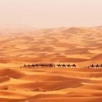 Desert Instagram Captions photo of the sand dunes in the Middle East.