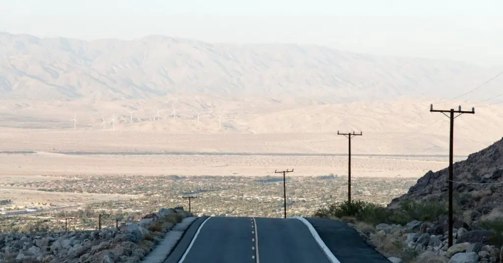 Palm Springs, California road in the desert for desert captions for Instagram photo. 