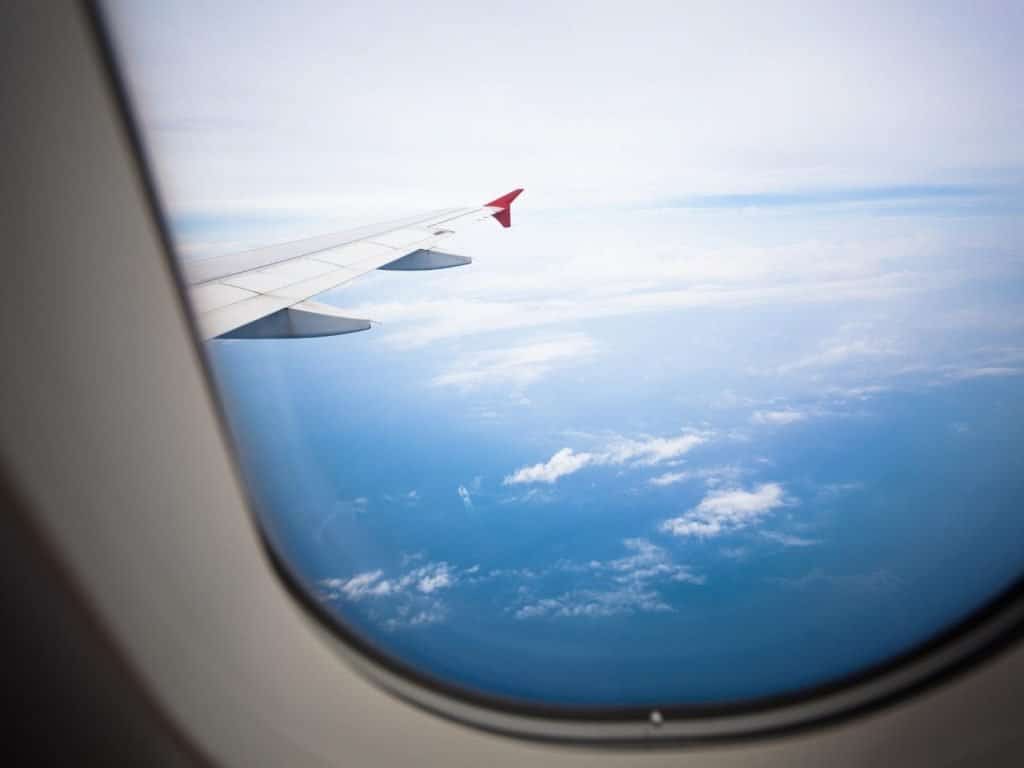 Vacation idioms photo of a window view from the plane. 