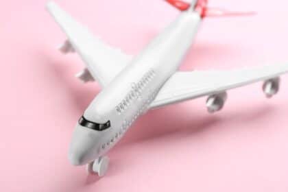 Idioms about travel photo of a toy airplane.