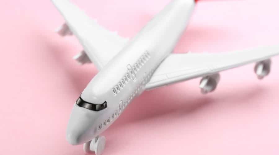 Idioms about travel photo of a toy airplane.