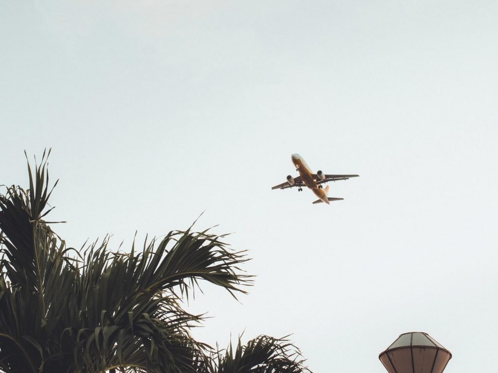 Fly captions for Instagram photo of an airplane flying in the sky. 