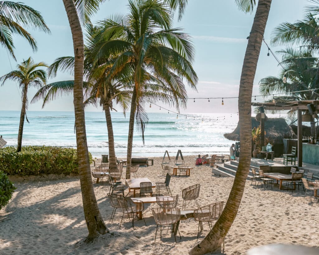 Tulum puns photo of a restaurant on Tulum beach. 