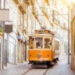 Portugal Instagram Captions photo of a tram in Portugal.