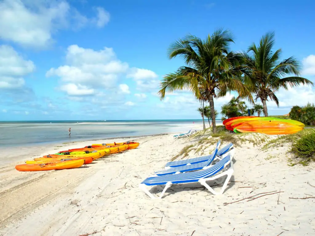 Kayaks on a beach in the Bahamas photo for Bahamas captions. 