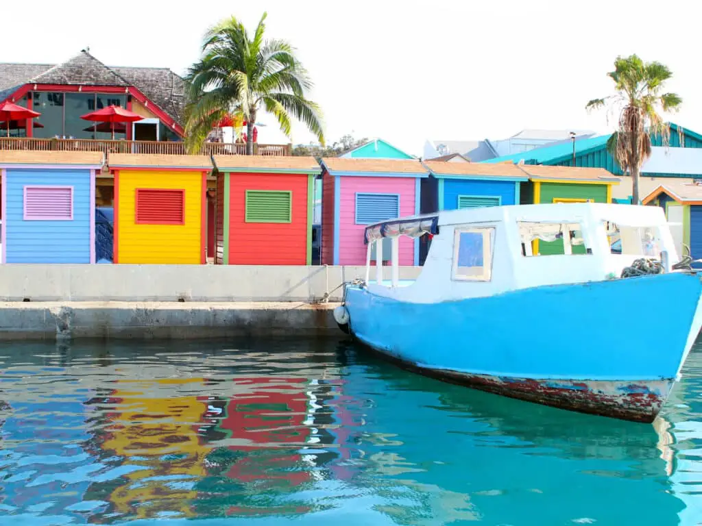 Bahamas captions photo of colorful shacks by the water in the Bahamas. 