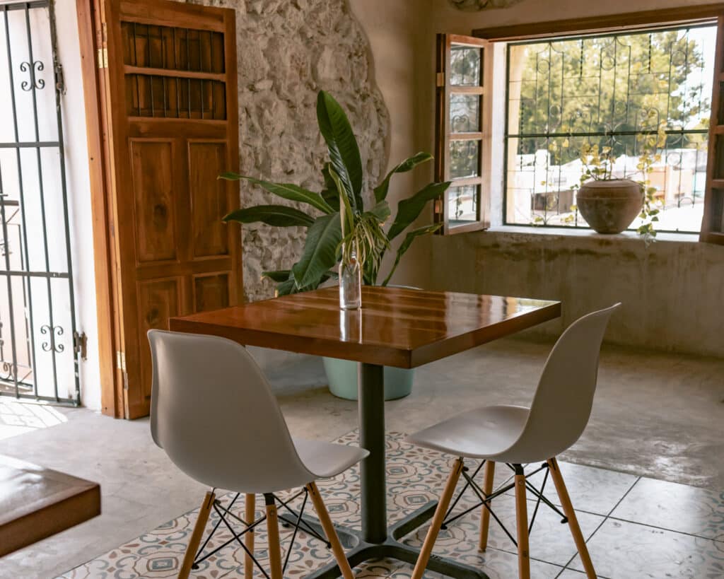 Table inside the bright and airy restaurant Casa Maca  one of the best places to eat in Valladolid. 