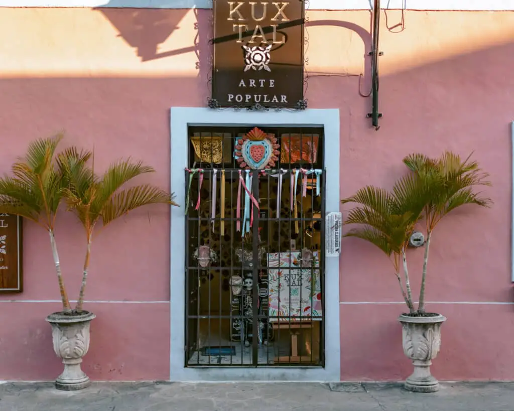 Beautiful bright pink store on Calzada De Los Frailes. One of the thins to do in Valladolid is walking this street. 