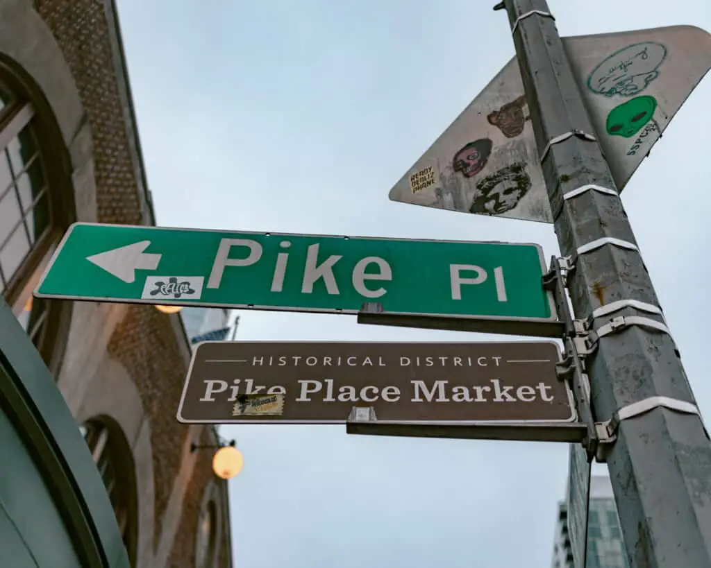 Pike Place street sign in a must see on a Seattle itinerary. 