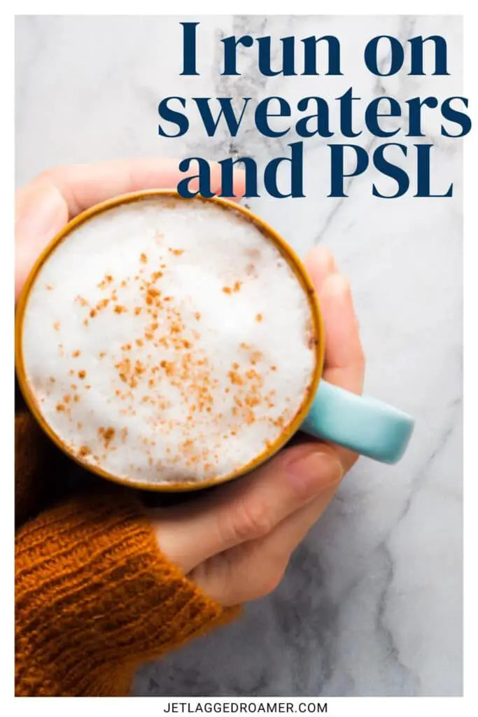 Woman wearing cozy sweater holding a pumpkin spice latte. Text has one of the fall Instagram captions saying "I run on sweaters and PSL."
