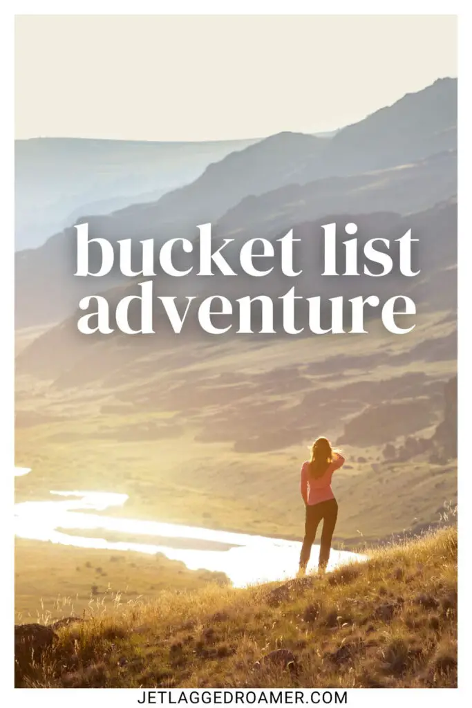 Photo of a woman alone in mountains for bucket list captions. Caption says bucket list adventure. 