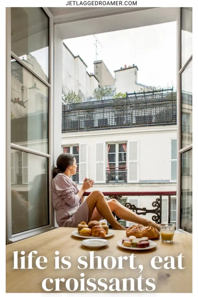 One of the croissant captions for Instagram that says life is short, eat croissants. Woman looking out a window in Paris with croissants. 