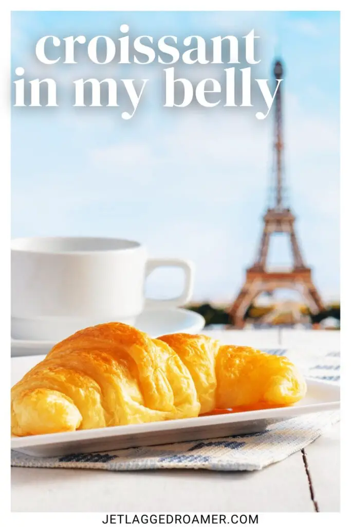 Croissant and coffee with a view of the Eiffel Tower with one of the croissant captions for Instagram that says croissant in my belly. 
