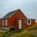 Things to do in Nanortalik, Greenland photo of a red home.