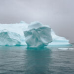 Off the beaten path travel photo of an iceberg in Greenland.