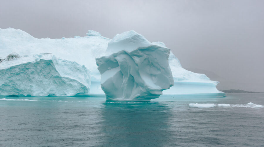 Off the beaten path travel photo of an iceberg in Greenland.