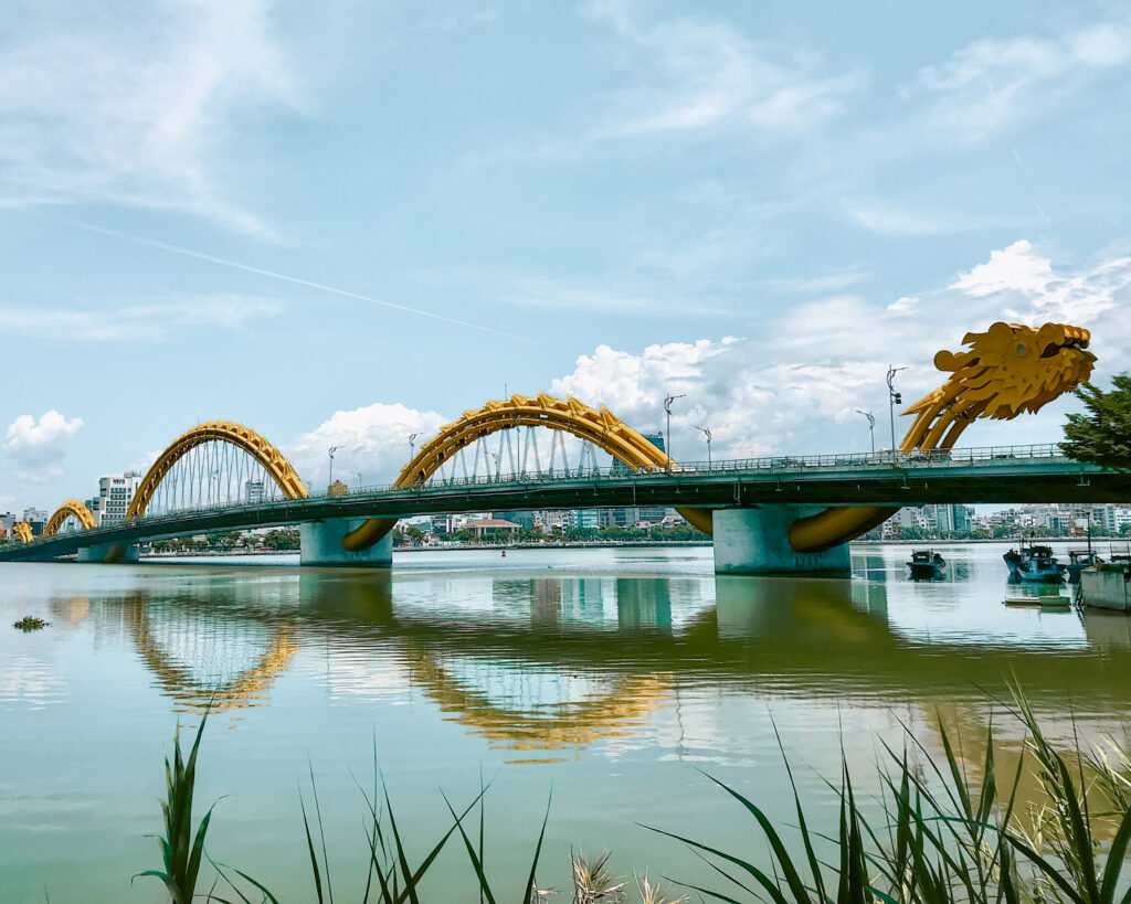 travel off a beaten path Bridge with a dragon in Da Nang, Vietnam.