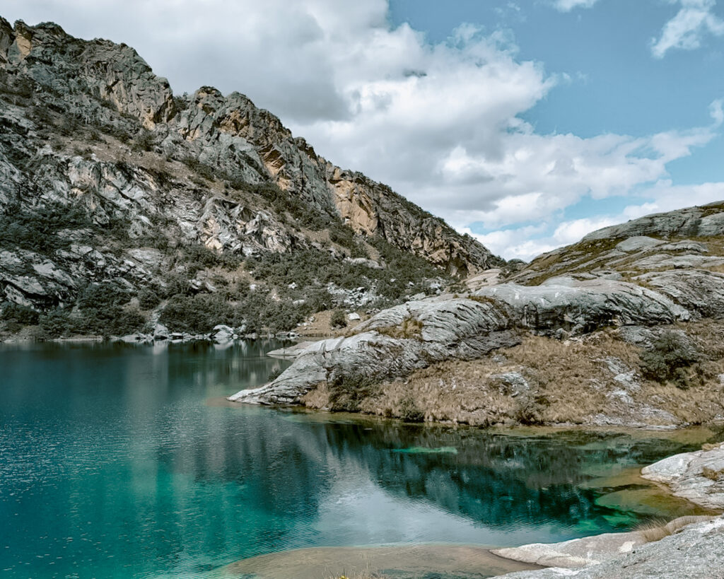 Lake in Huaraz, Peru an off the beaten path South America travel destination. 