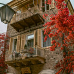 Beautiful building surrounded by bougainvillea in Nafplio, Greece.